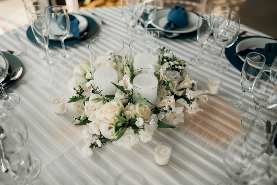 Stone tealight holders on a natural linen tablecloth