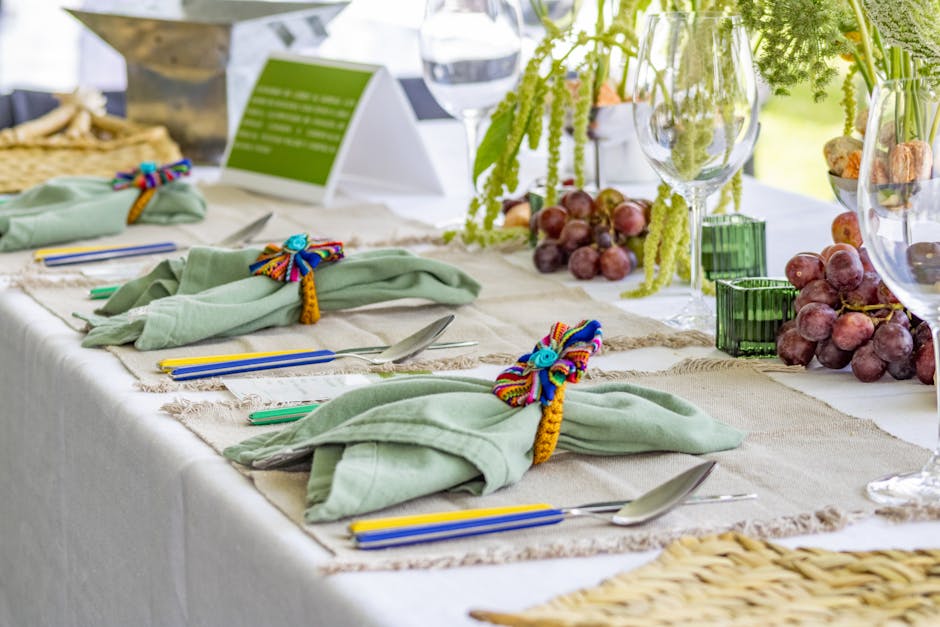 Ivory damask linen tablecloth under candlelight on a formal dining table